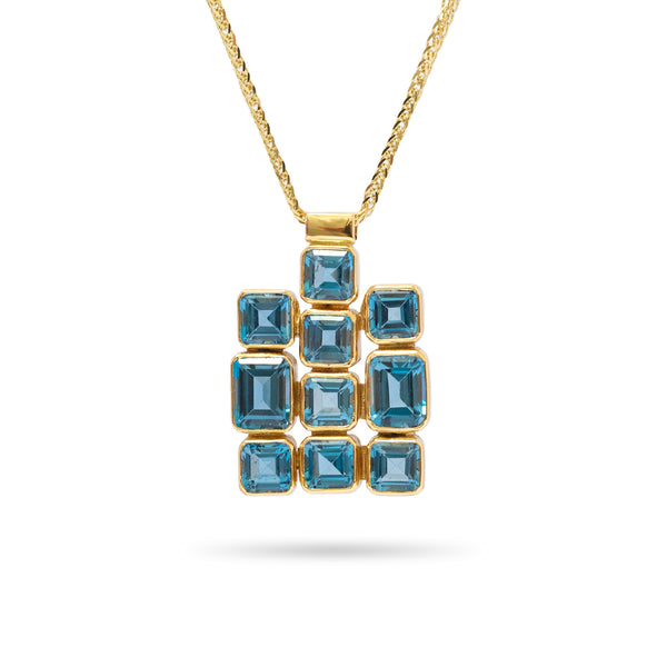 18K gold pendant with Blue Topaz. 20 inch Spiga chain 14K